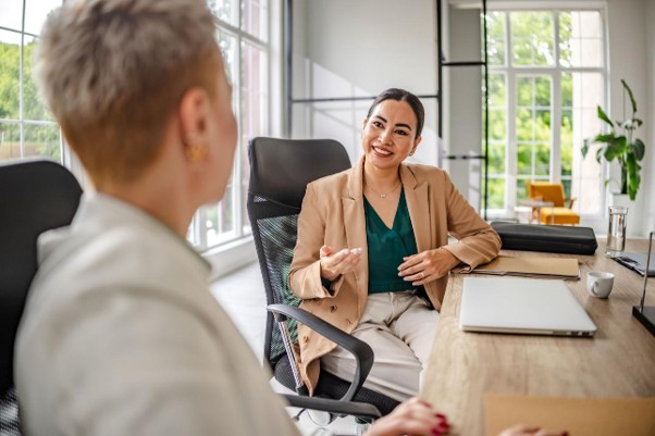 Two people in a coaching conversation